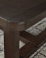 Breckington - Rectangular Cocktail Table - Dark Brown