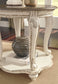 Realyn - Round End Table - White / Brown