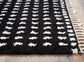Minston - 5' x 7' Rug - Black / White