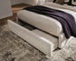 Shoralli - Queen Upholstered Storage Bed - Beige