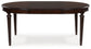 Lavinton - Oval Dining Room Extension Table - Brown