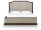 Wickenger - King Upholstered Panel Bed - Dark Brown