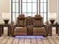 Gruaro - Power Reclining Loveseat With Console / Adjustable Headrest - Amber
