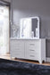 Jarlee - 4 Pc. - King Panel Bed, Dresser, Mirror And Nightstand - White