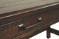 Baldridge - Home Office Large Leg Desk - Rustic Brown