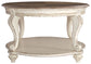 Realyn - Oval Cocktail Table - White / Brown