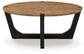 Hanneforth - Round Cocktail Table - Brown