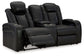 Caveman Den - Power Reclining Loveseat with Console/ Adj Hdrst - Midnight