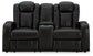 Caveman Den - Power Reclining Loveseat with Console/ Adj Hdrst - Midnight
